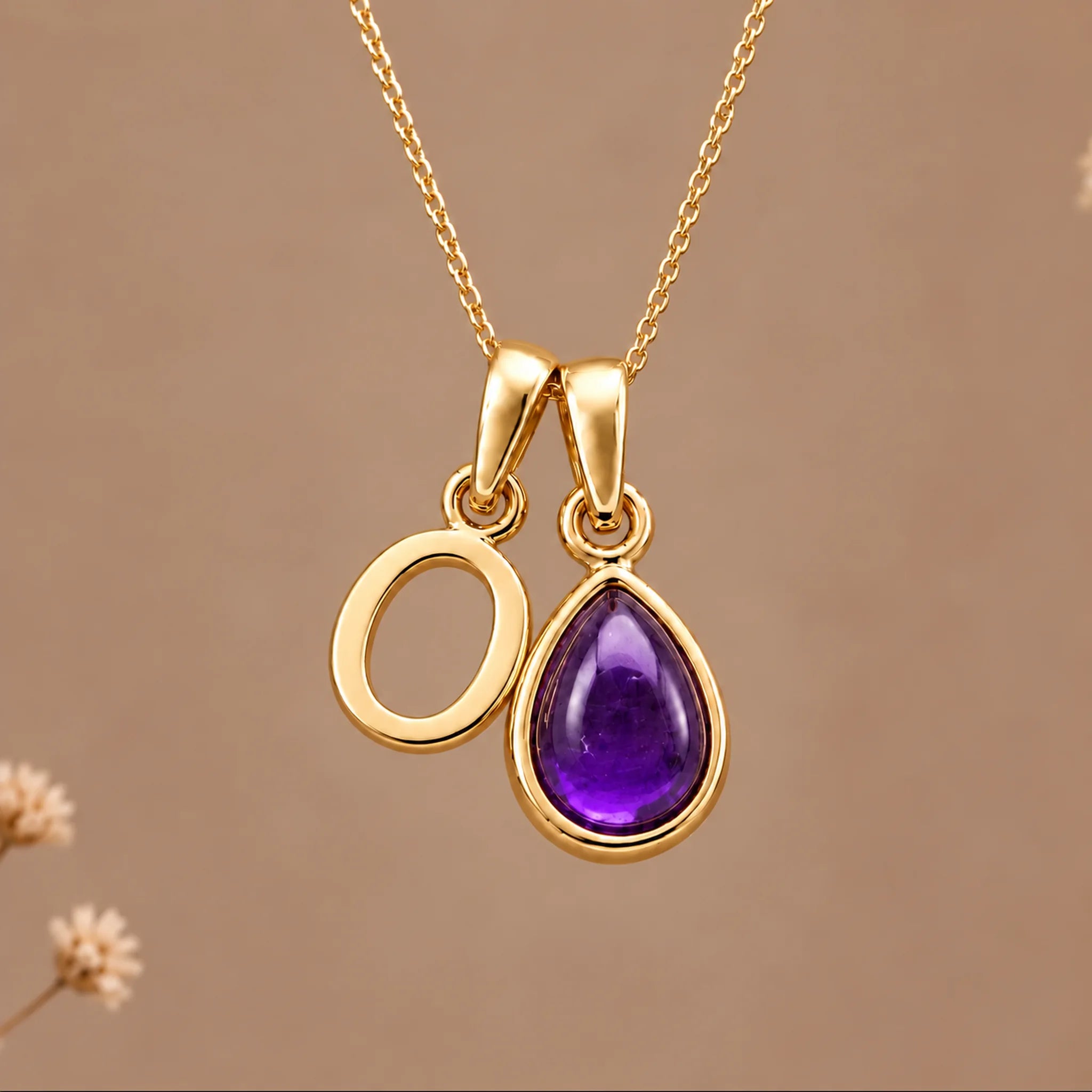 Gold initial O necklace with a natural February amethyst