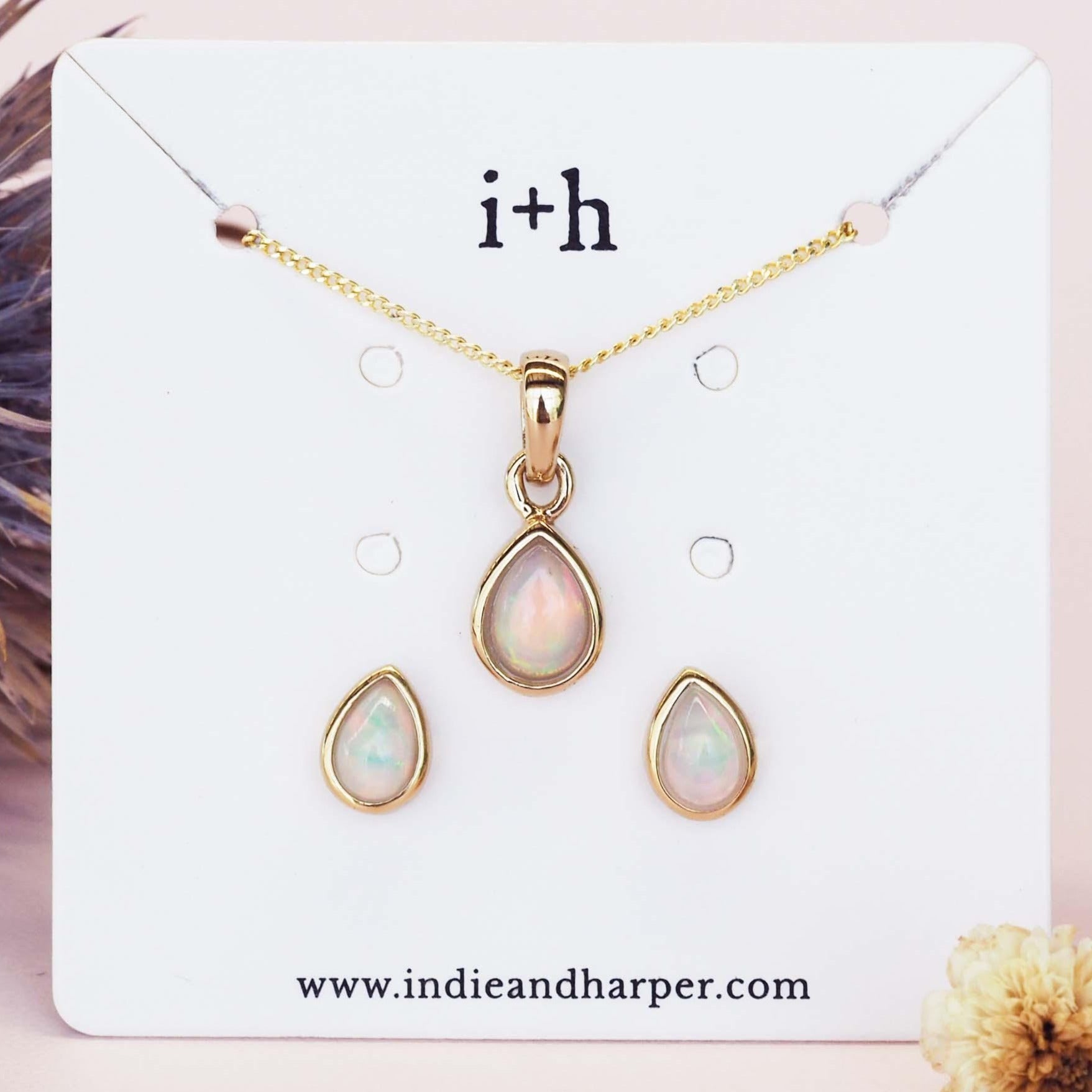 Gold October Birthstone opal Jewellery set including pear-shaped opal stud earrings and opal pendant necklace