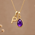 Gold initial P necklace with a natural February amethyst