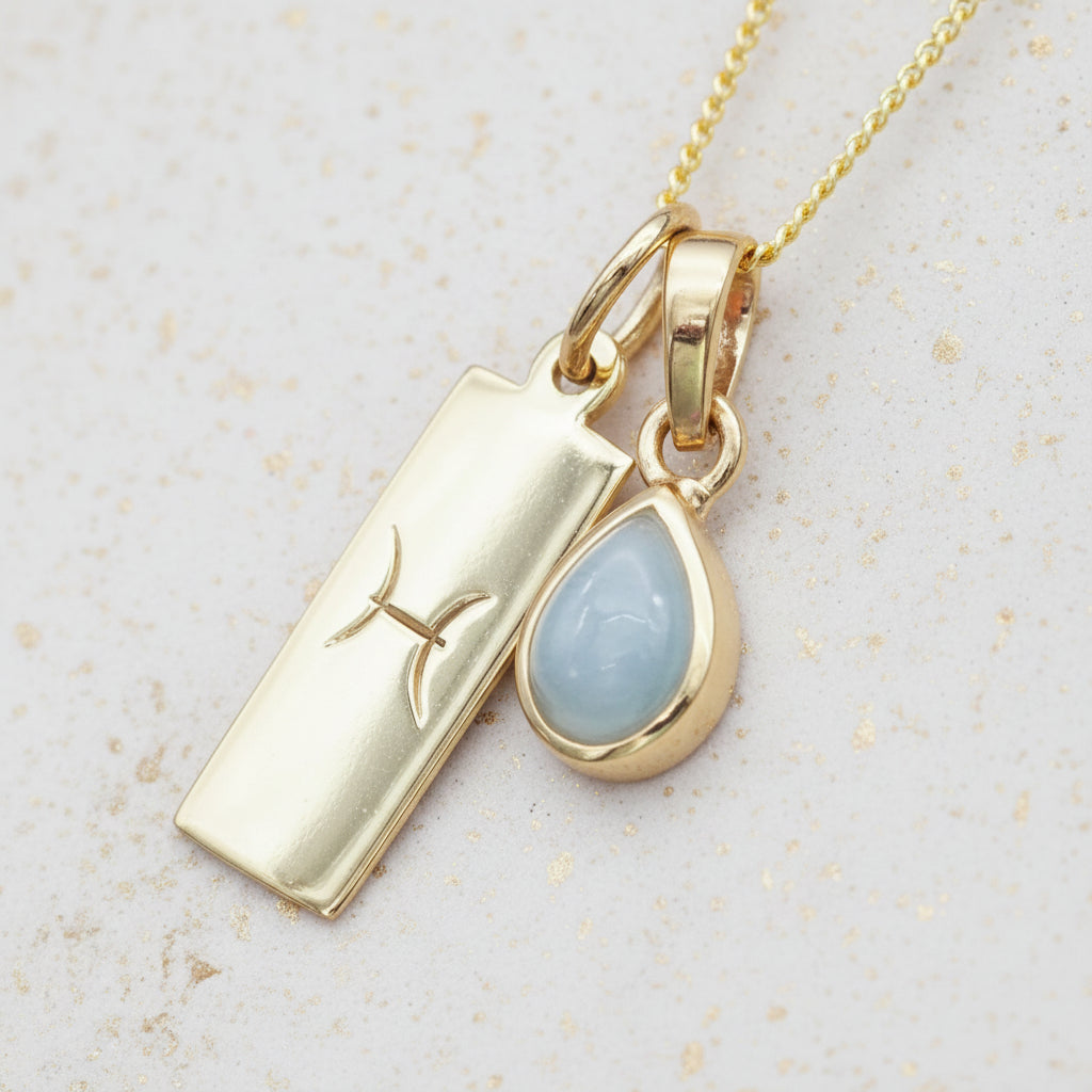 Gold Pisces pendant and march Birthstone aquamarine pendant on a Gold Chain