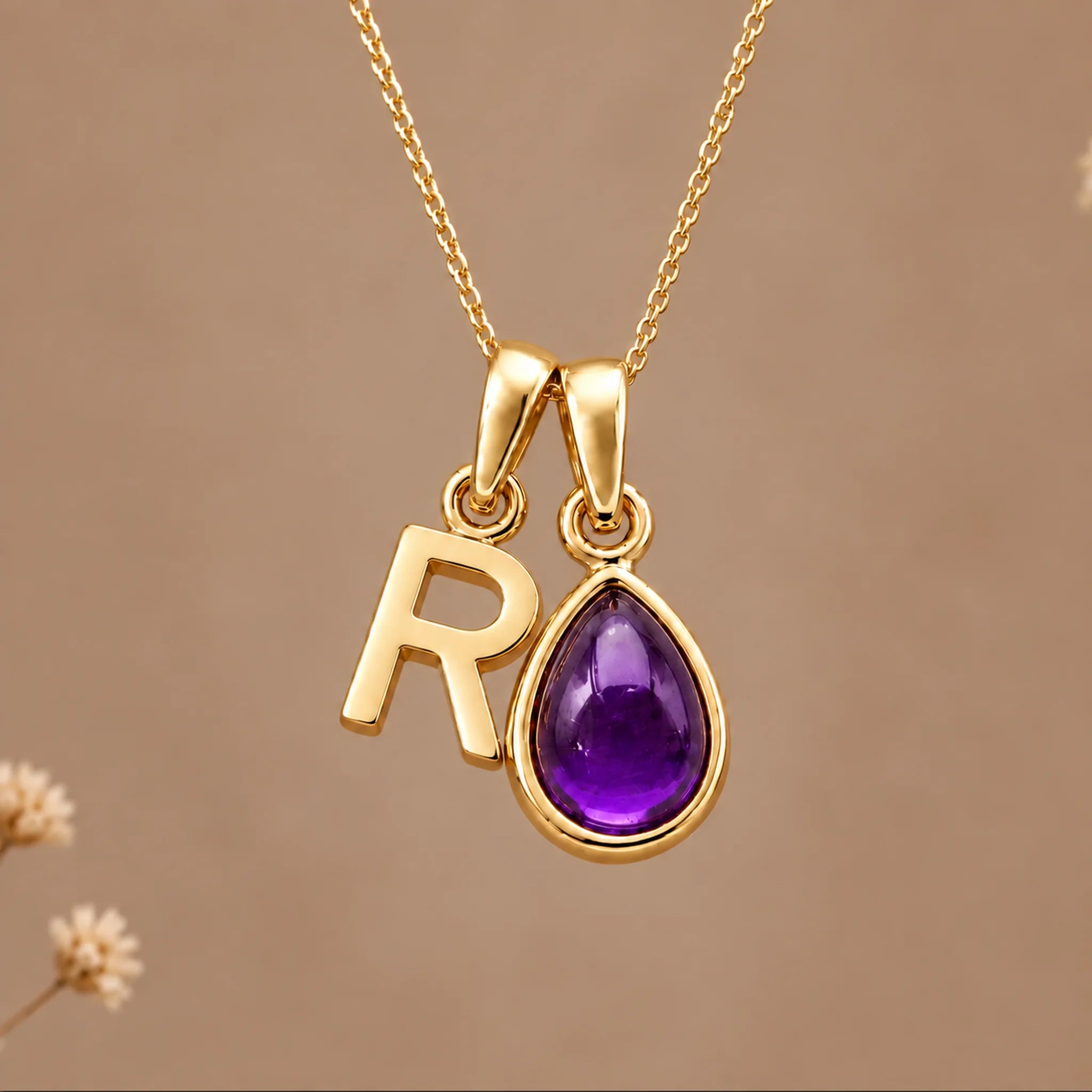 Gold initial R necklace with a natural February amethyst