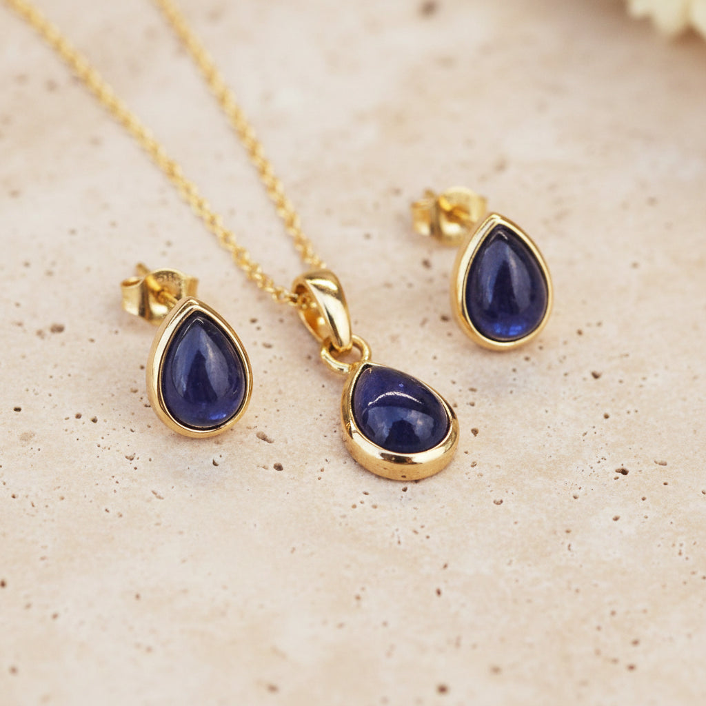 gold tear drop shape September Birthstone sapphire stud earrings and matching necklace 