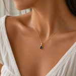 gold september birthstone natural sapphire pendant necklace worn