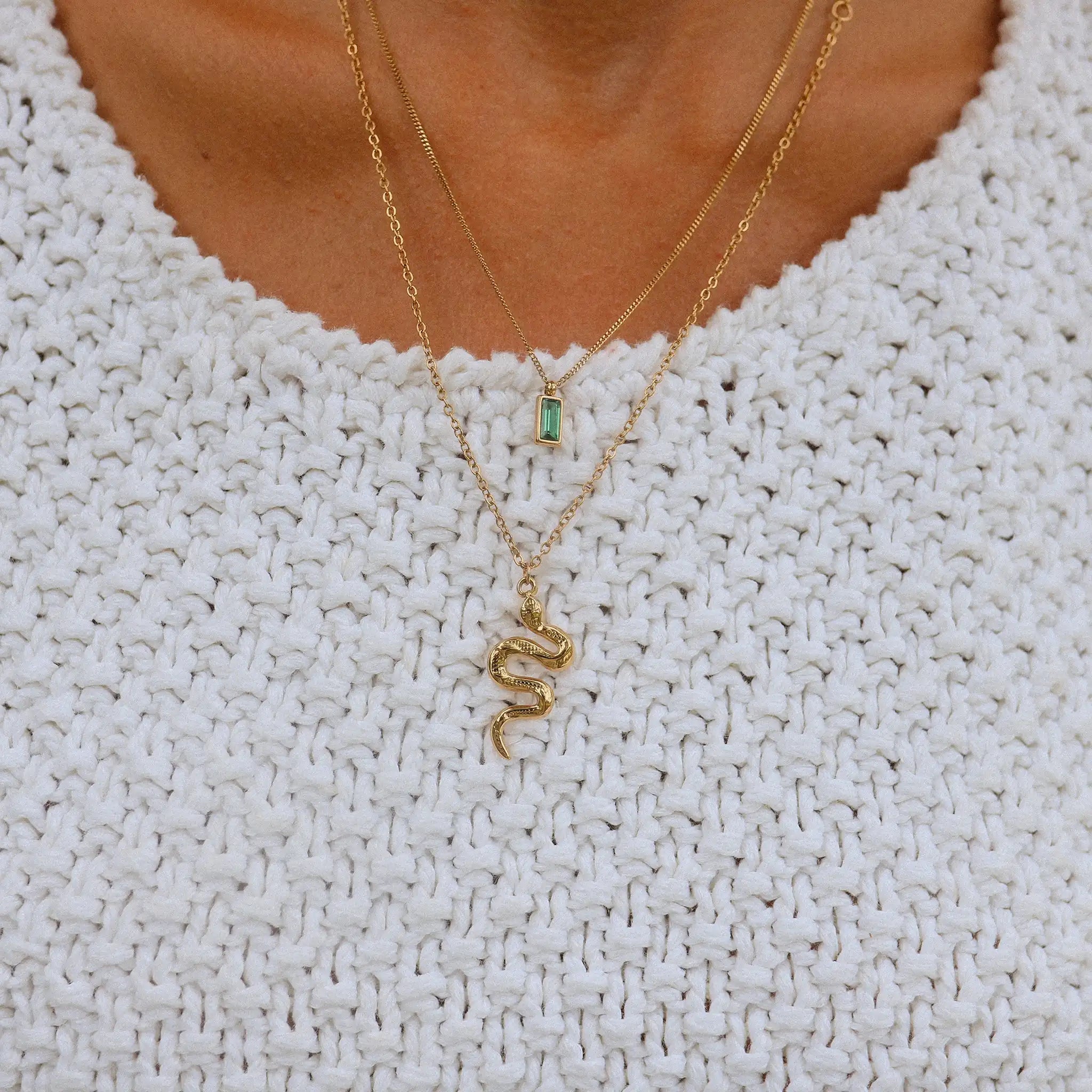Woman wearing gold snake necklace - waterproof jewellery by indie and Harper australia