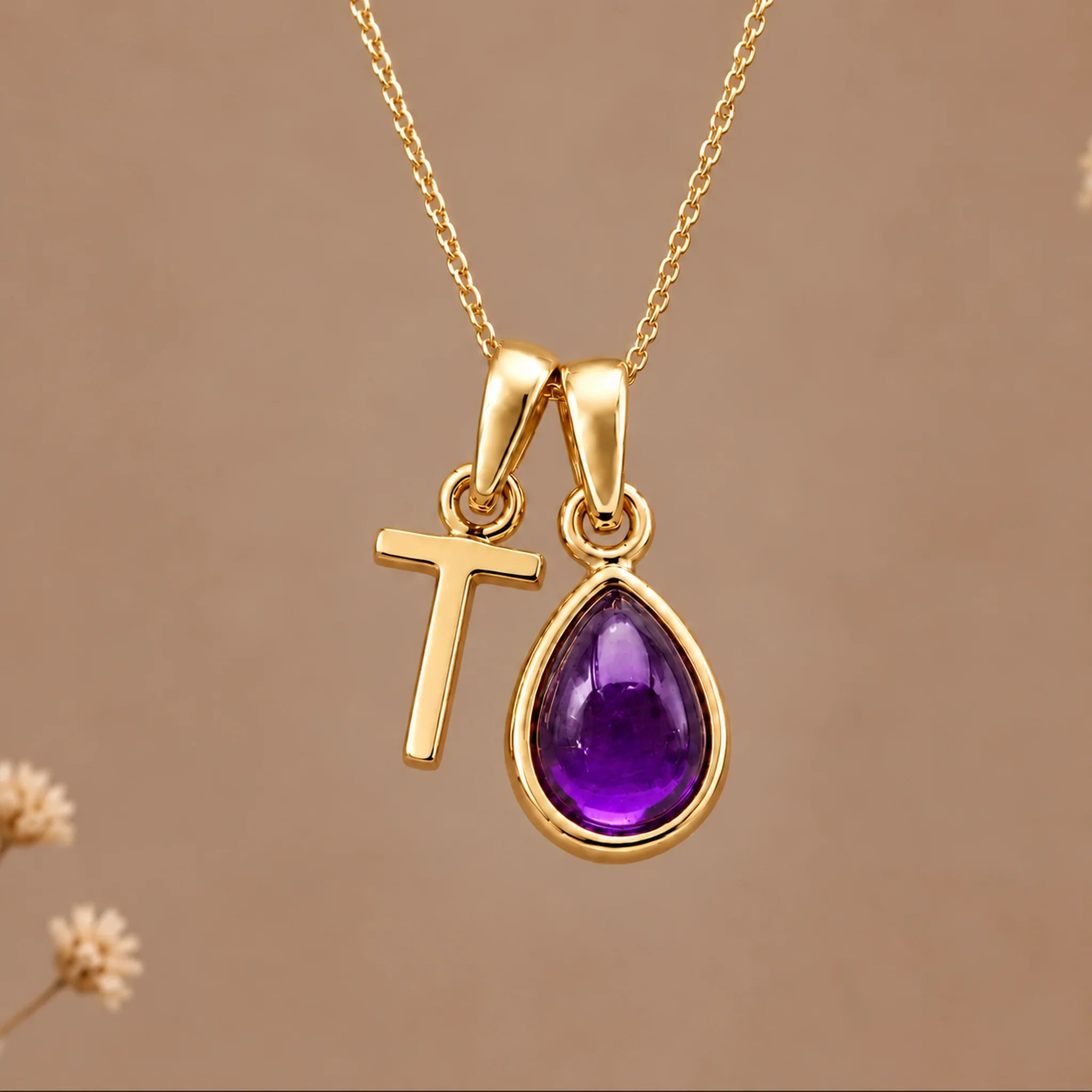 Gold initial T necklace with a natural February amethyst