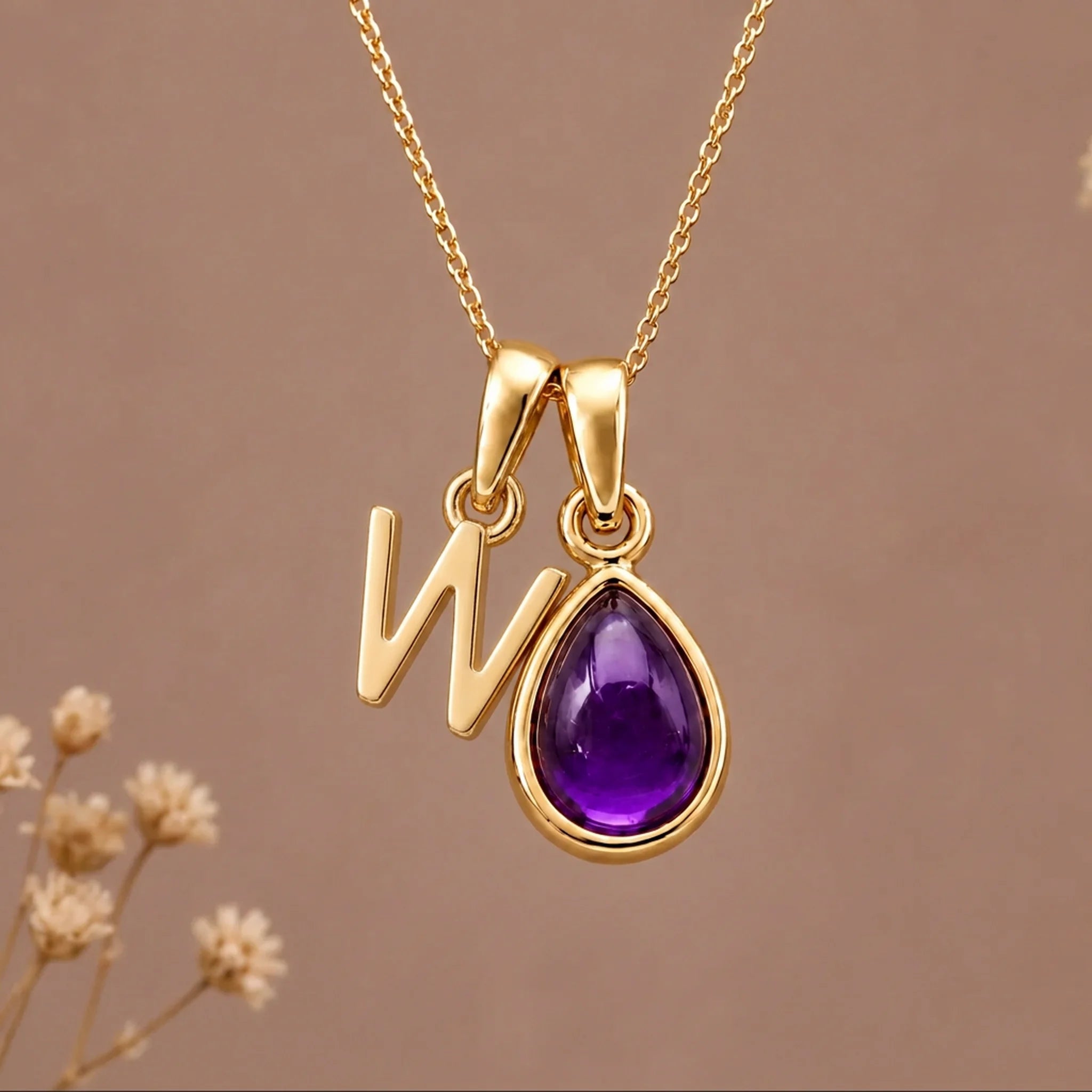 Gold initial W necklace with a natural February amethyst