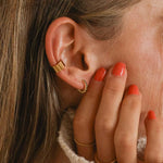 Woman wearing gold Ear Cuffs - gold waterproof jewellery by indie and harper australia