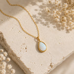 dainty gold teardrop white opal necklace