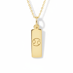 Gold necklace chain with a gold pendant with the zodiac cancer star sign 