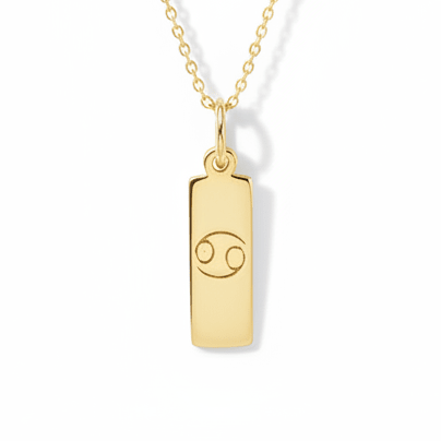 Gold necklace chain with a gold pendant with the zodiac cancer star sign 