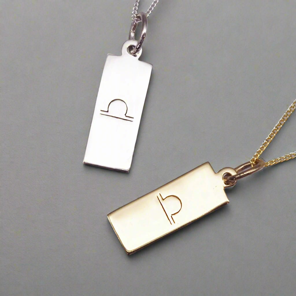 indie and harper Libra Zodiac necklaces in silver and gold