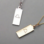 indie and harper Libra Zodiac necklaces in silver and gold