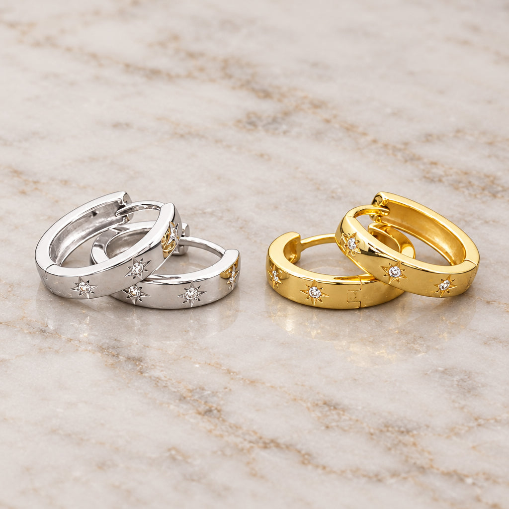 Dainty star huggie hoop earrings with cubic zirconia in silver and gold