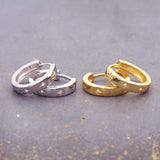 indie and harper dainty hoop earrings made with cubic zirconia, sterling silver and gold plating