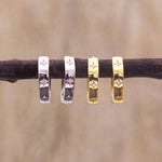 indie and harper silver and gold dainty huggie style earrings with beautiful star detailing and cubic zirconia