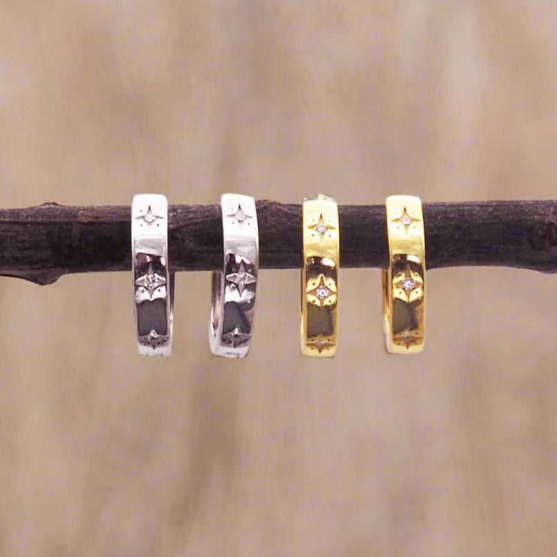indie and harper silver and gold dainty huggie style earrings with beautiful star detailing and cubic zirconia