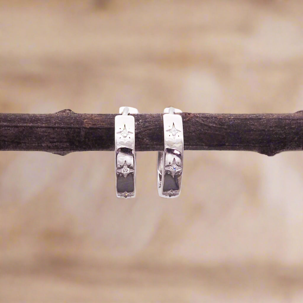 indie and harper sterling silver huggie earrings with star detailing with cubic zirconia