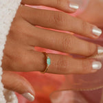woman wearing a Dainty Gold Paraiba Tourmaline Ring by indie and harper