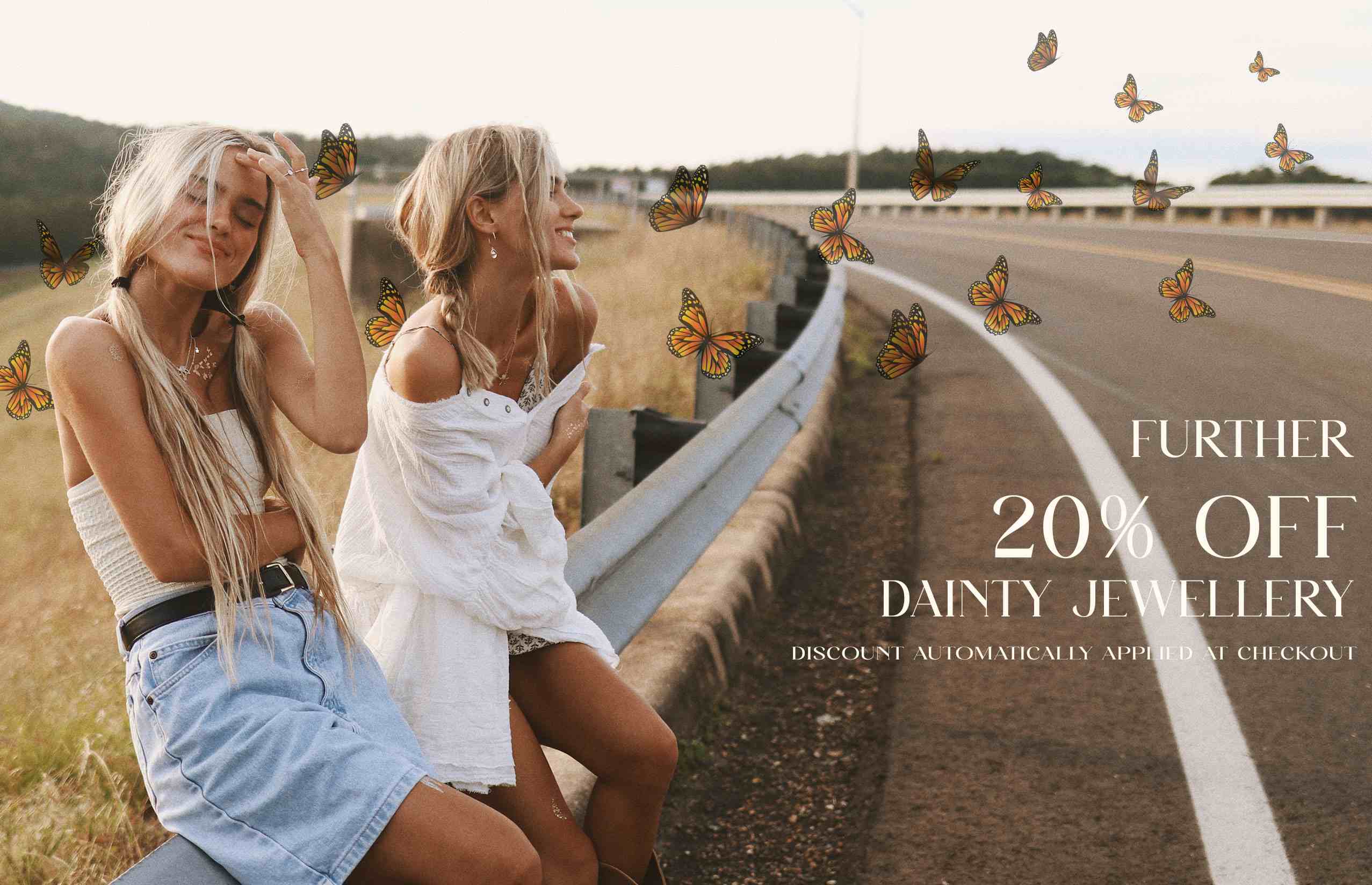 indie and harper dainty jewellery sale banner with two girls smiling with butterflies