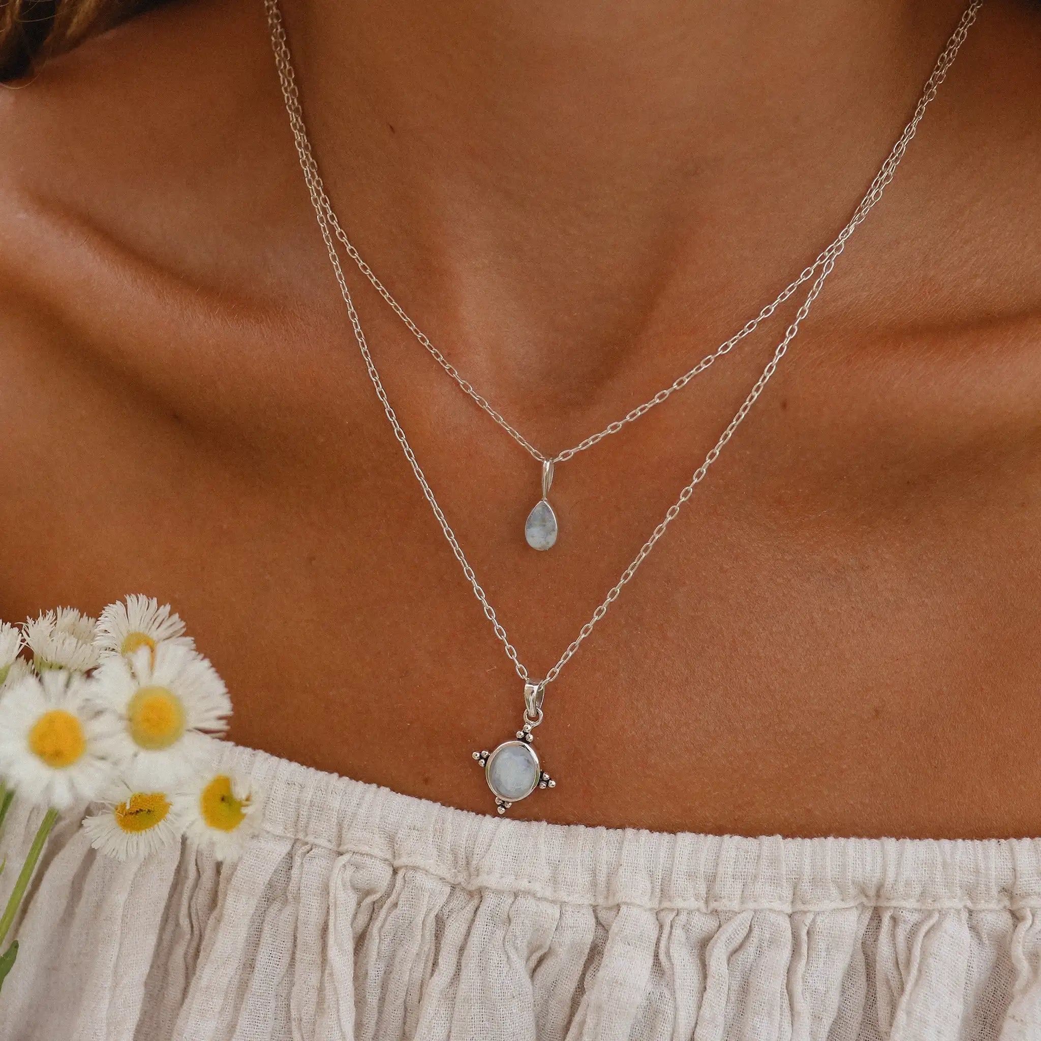 Indie and Harper dainty Sterling silver moonstone necklaces being worn