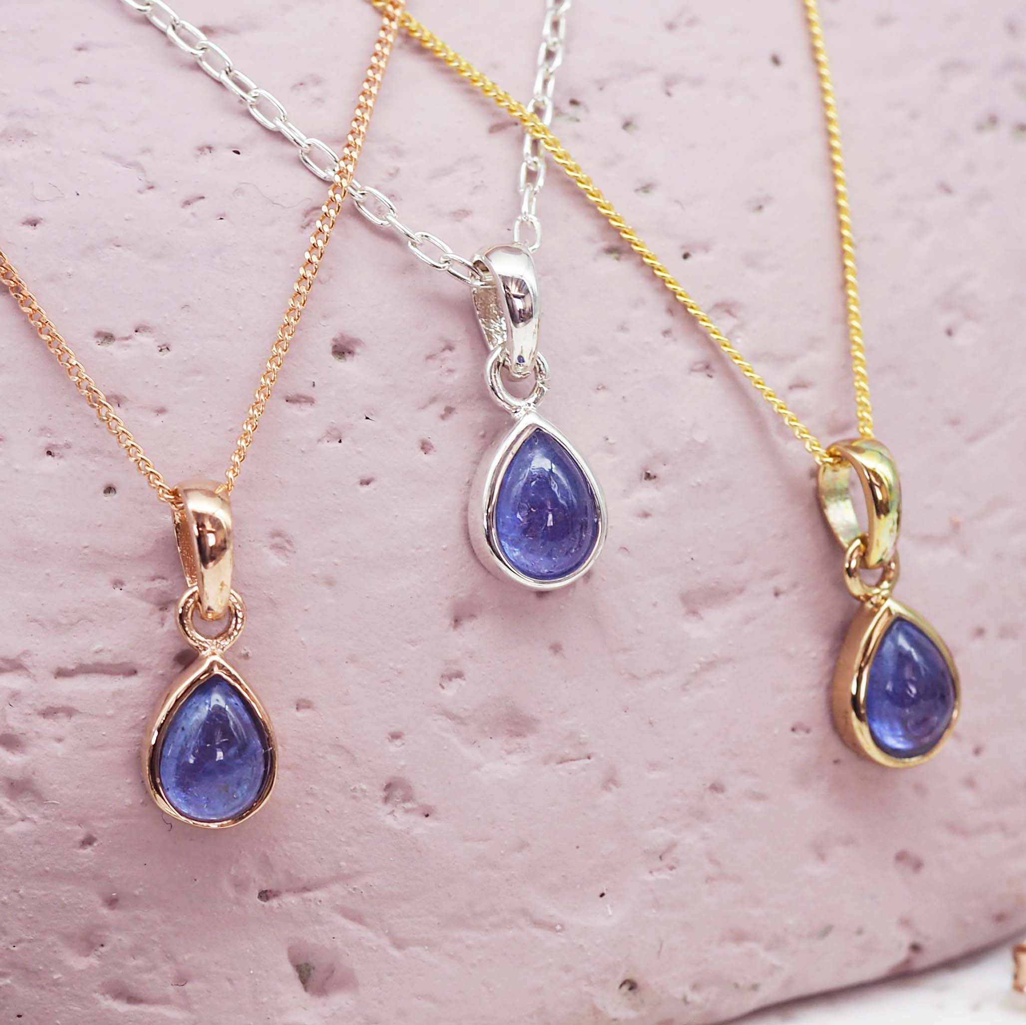 indie and harper december birthstone tanzanite necklaces in rose gold, silver and gold