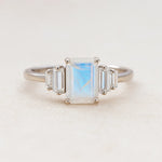 Silver Moonstone ring with a rectangular gemstone on a light background