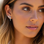 indie and harper ethereal glow opal earrings being worn