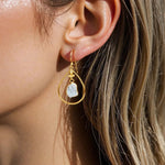 indie and harper gold aquamarine drop earrings being worn