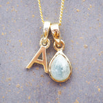 Gold Initial and March Birthstone Aquamarine necklace by indie and Harper australia