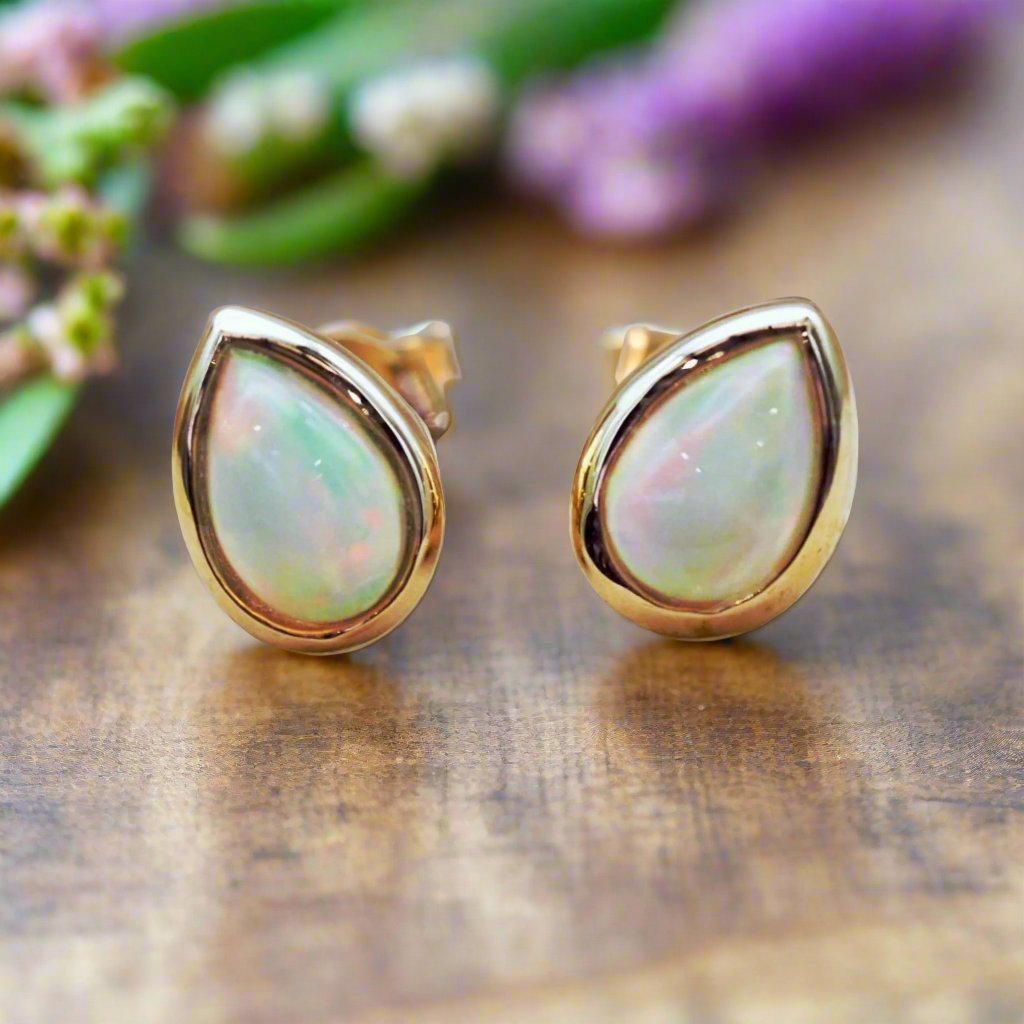 gold october birthstone opal earrings by indie and harper