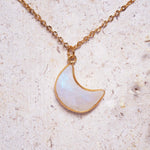 indie and harper statement moonstone necklace with gold plating over stainless steel.