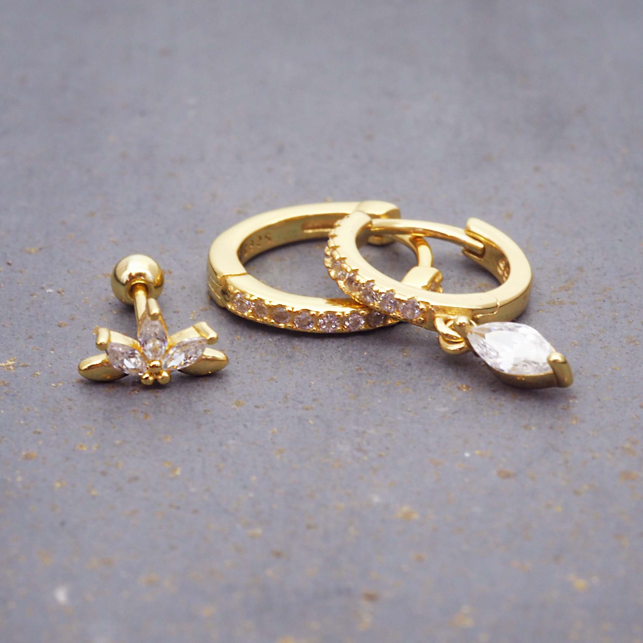 indie and harper dainty gold earrings set with dainty cubic zirconia