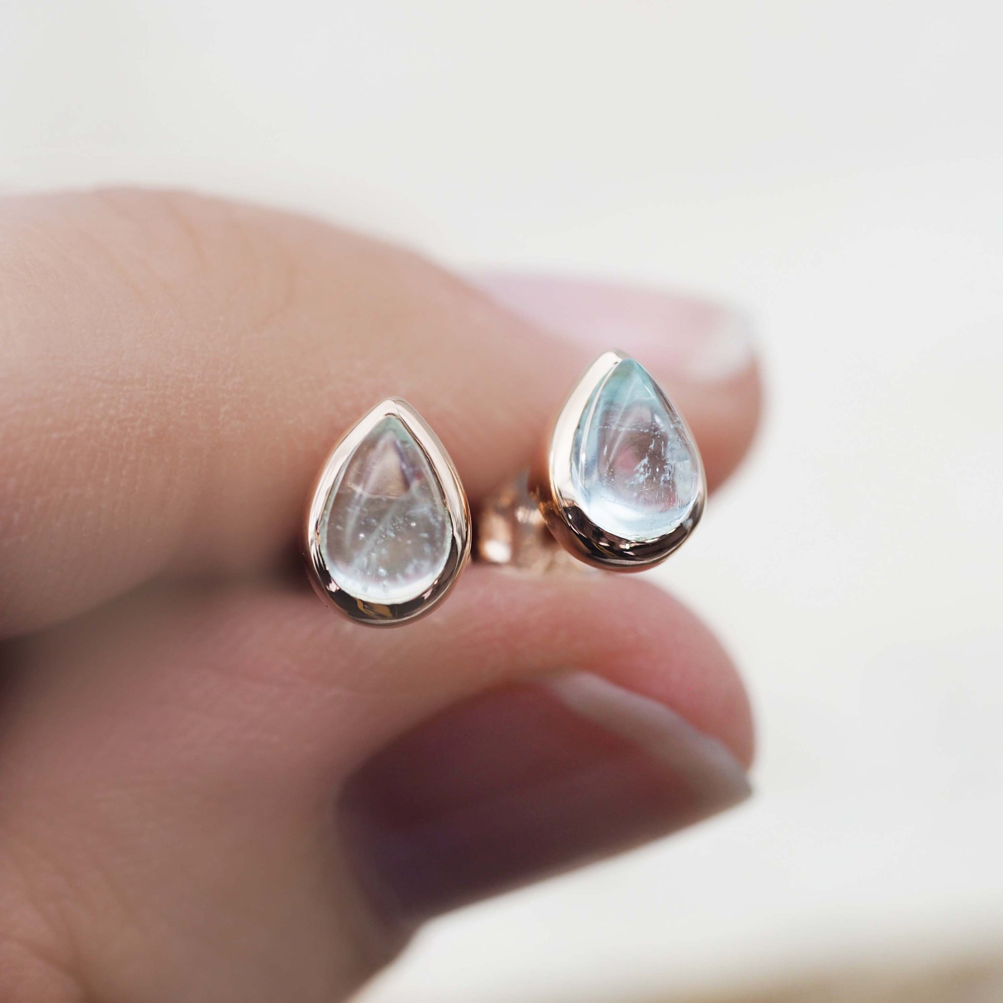 indie and harper rose gold march birthstone aquamarine earrings