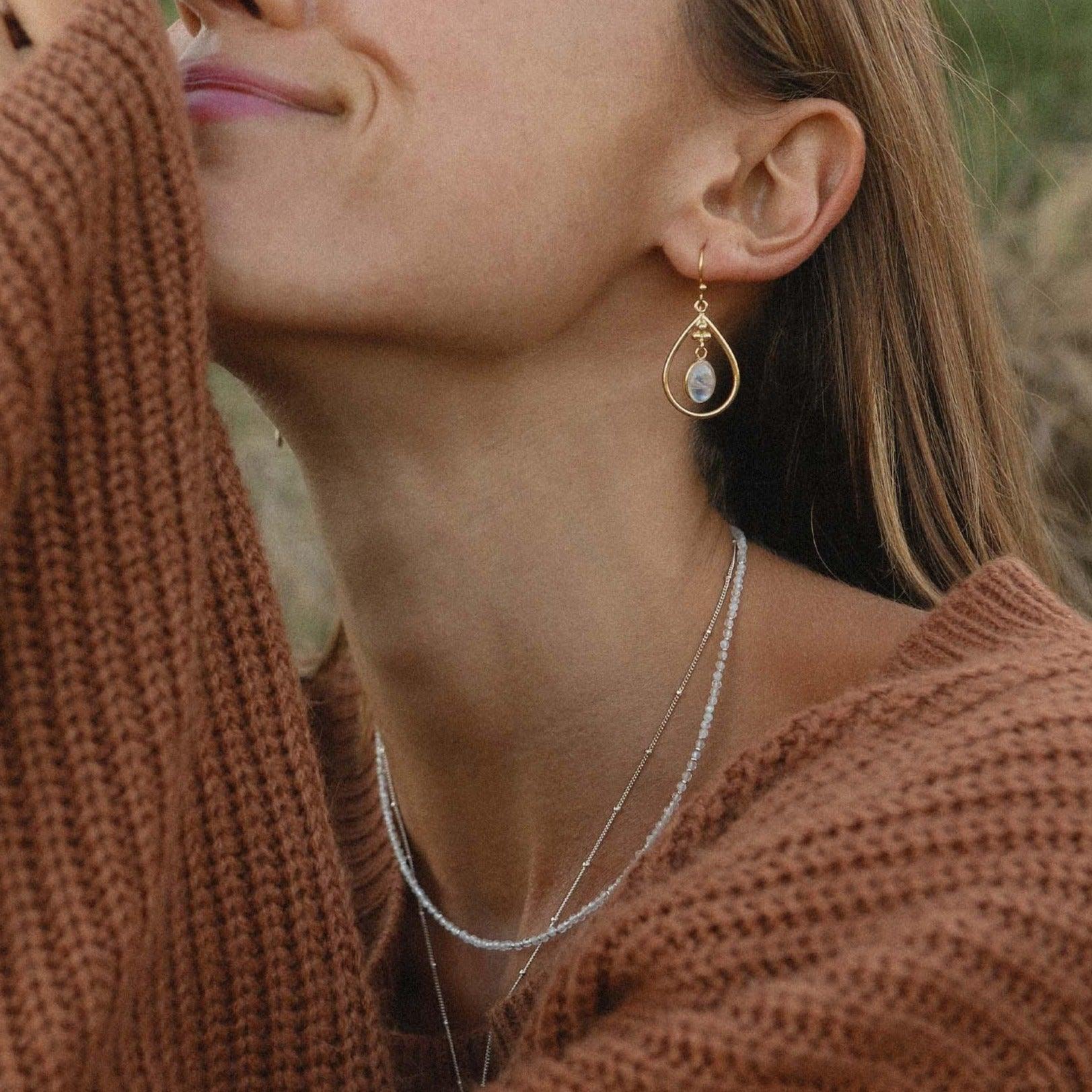Woman wearing moonstone Beaded necklace by indie and harper 