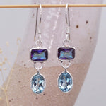 dainty mystic quartz and blue topaz earrings by indie and harper
