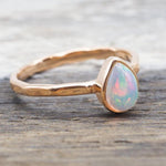 indie and harper rose gold october birthstone opal ring