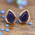 rose gold september birthstone sapphire earrings by indie and harper