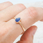 indie and harper rose gold september birthstone sapphire ring being worn