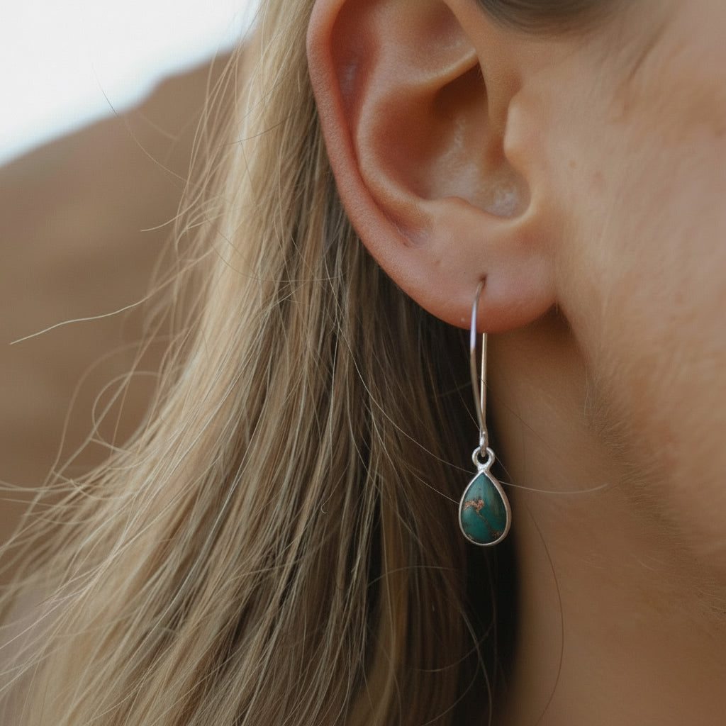 Woman wearing sterling silver Turquoise Earrings by australian jewellery brand indie and harper