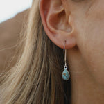Woman wearing sterling silver Turquoise Earrings by australian jewellery brand indie and harper