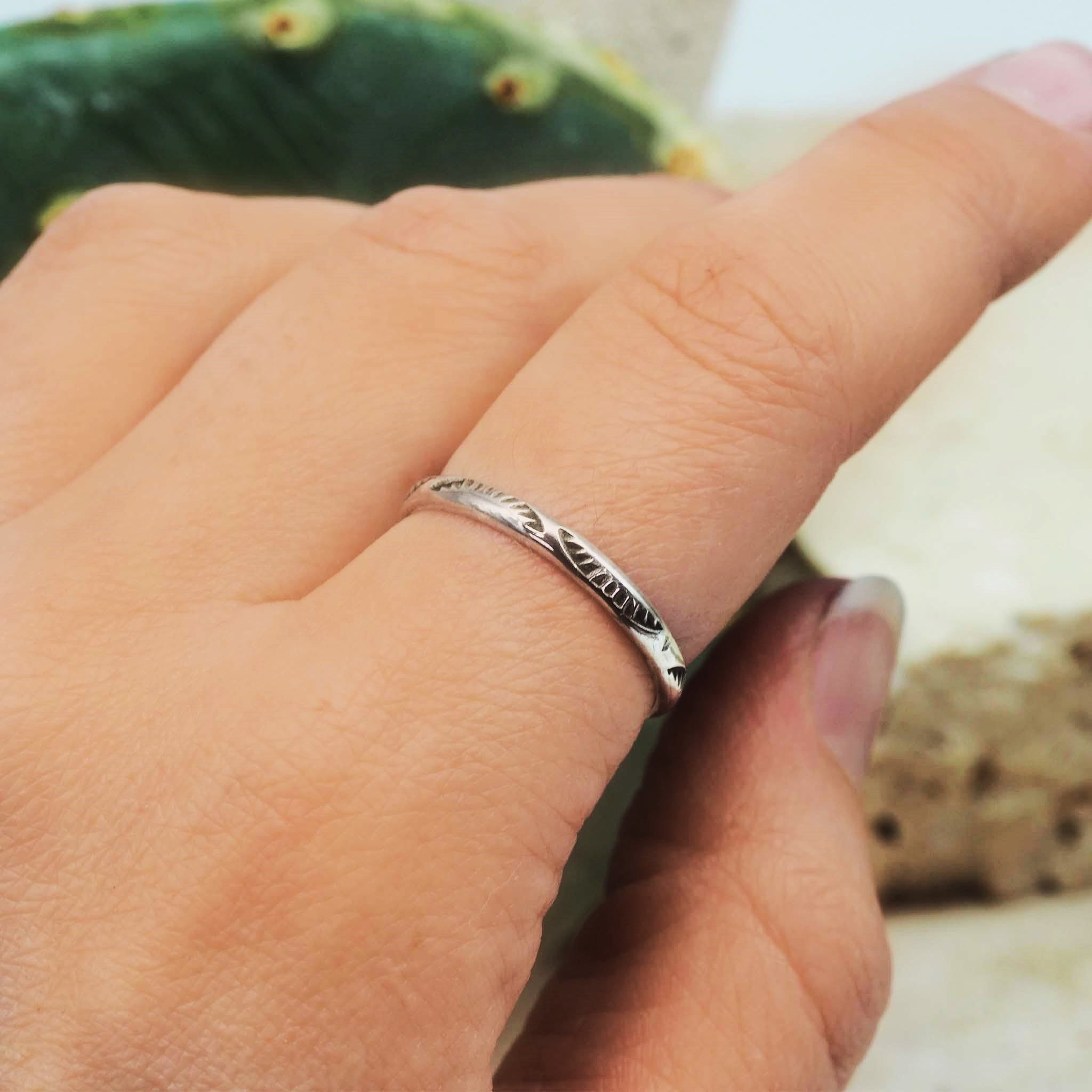 silver hand carved navajo ring being worn - native american jewelry by indie and harper australia