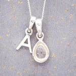 indie and harper sterling silver initial a pendant and april birthstone necklace