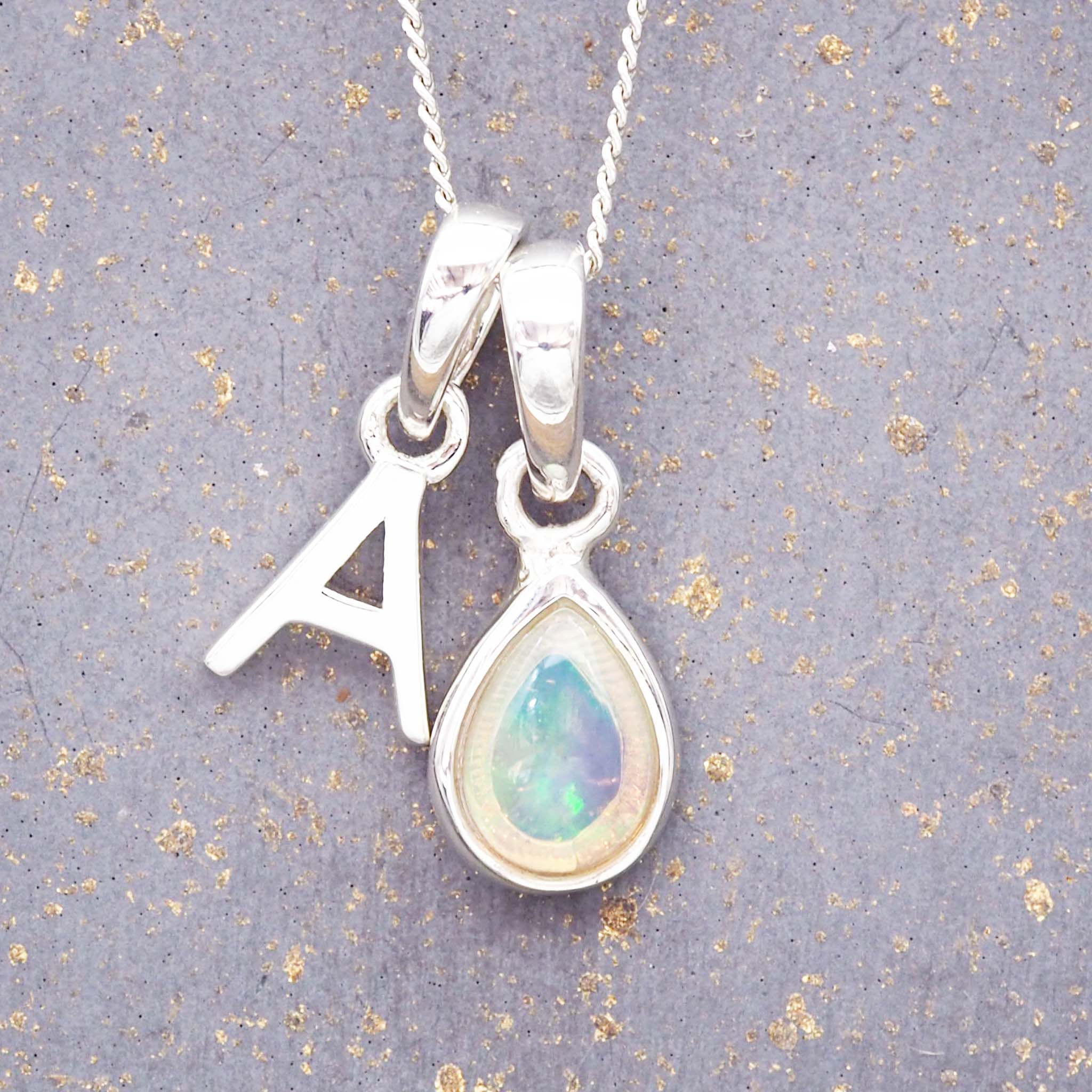 sterling silver initial a pendant and october birthstone opal necklace by indie and harper australia