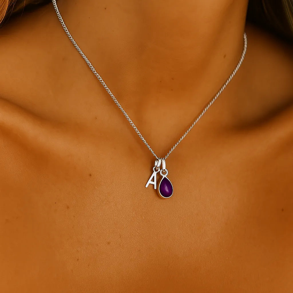 sterling silver initial and february birthstone amethyst necklace being worn - by indie and harper australia