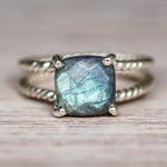 indie and harper silver labradorite double twist ring showing natural iridescent stone
