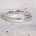 white opal band ring made with white synthetic opal and sterling silver