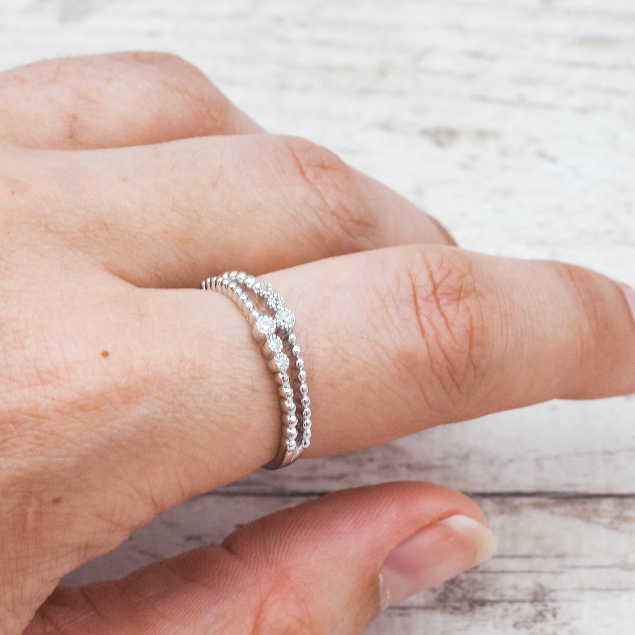 Finger wearing a Dainty Sterling silver ring - Sterling silver jewellery by indie and harper australia