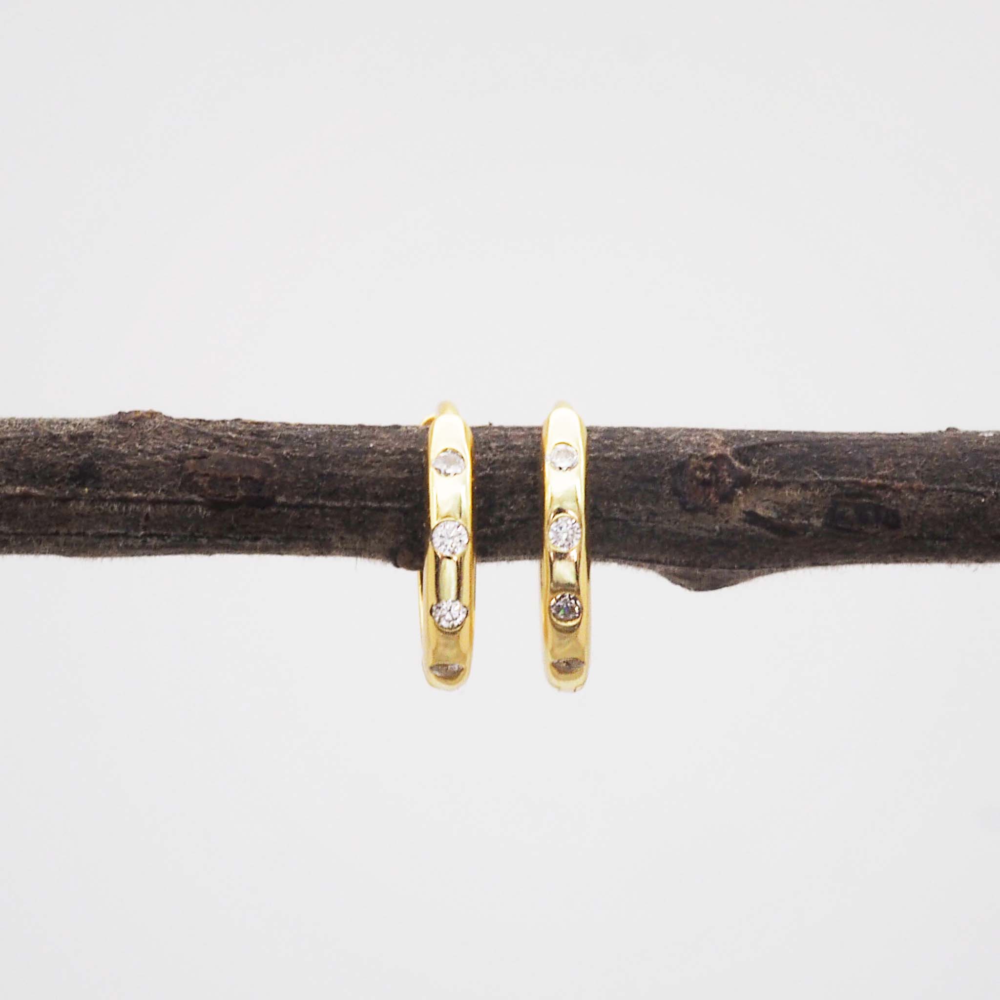 indie and harper gold Hoop earrings with cubic zirconias