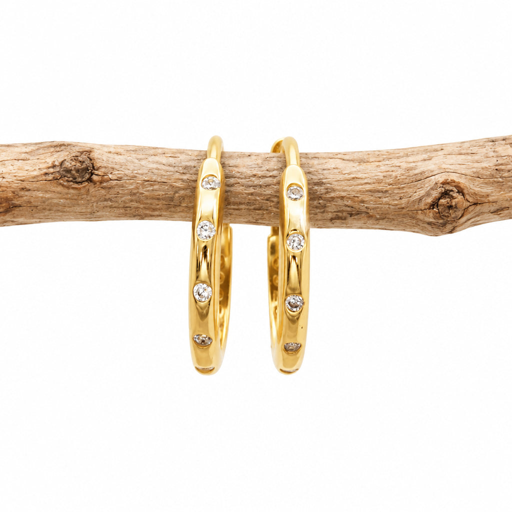 Gold CZ stacking hoop earring from another angle