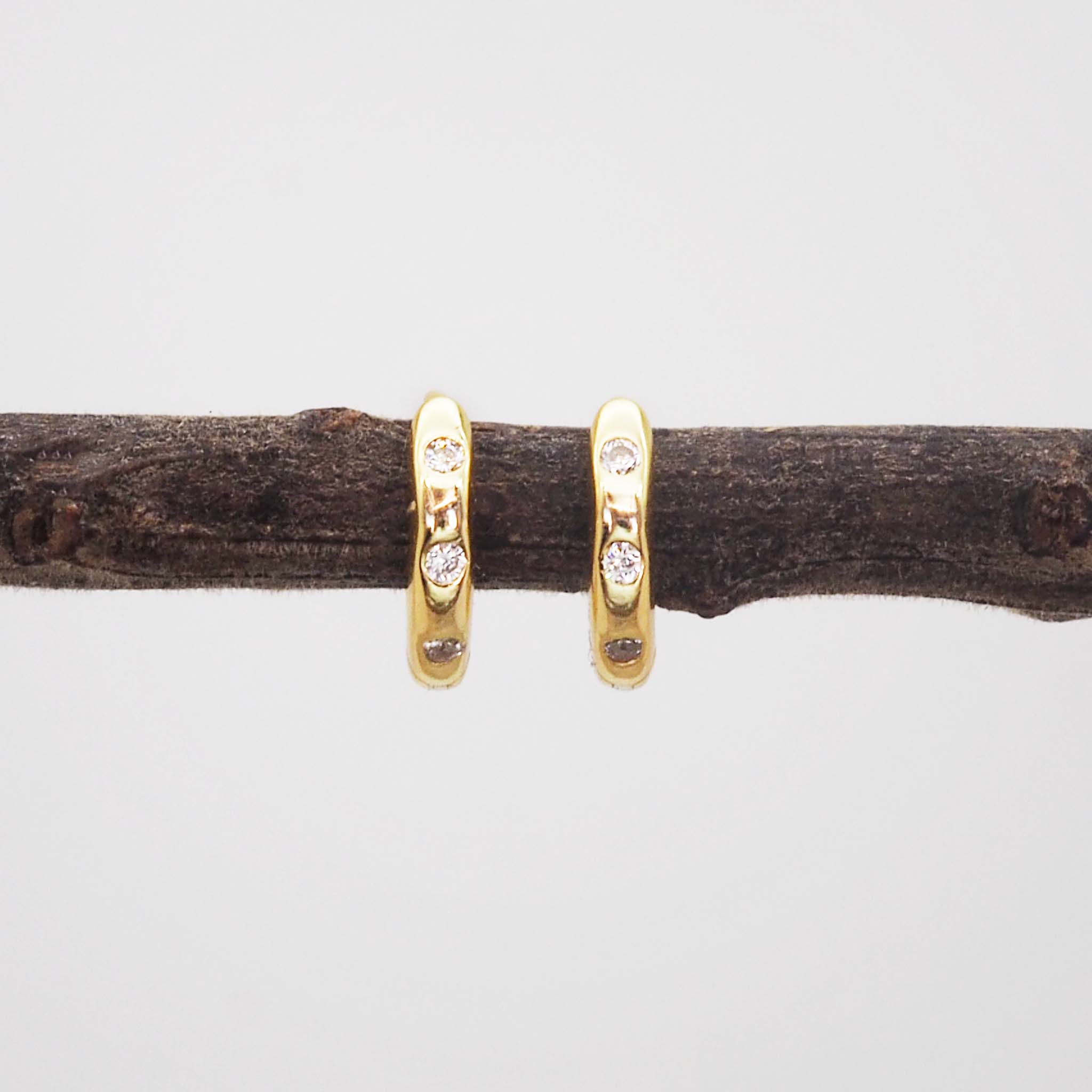 indie and harper gold Hoop earrings with cubic zirconias